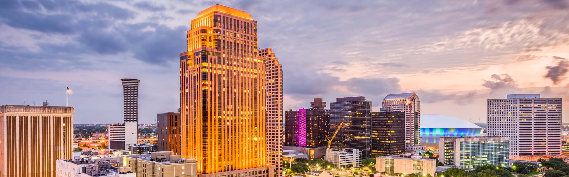 Neon color image of a band playing and people singing along